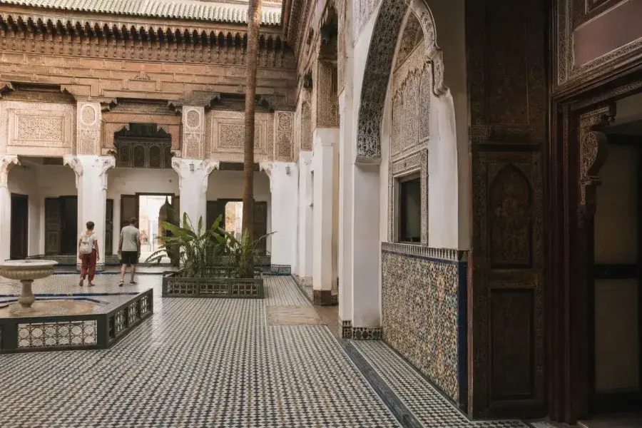 Decorated courtyard and zellige tilework inside Bahia Palace