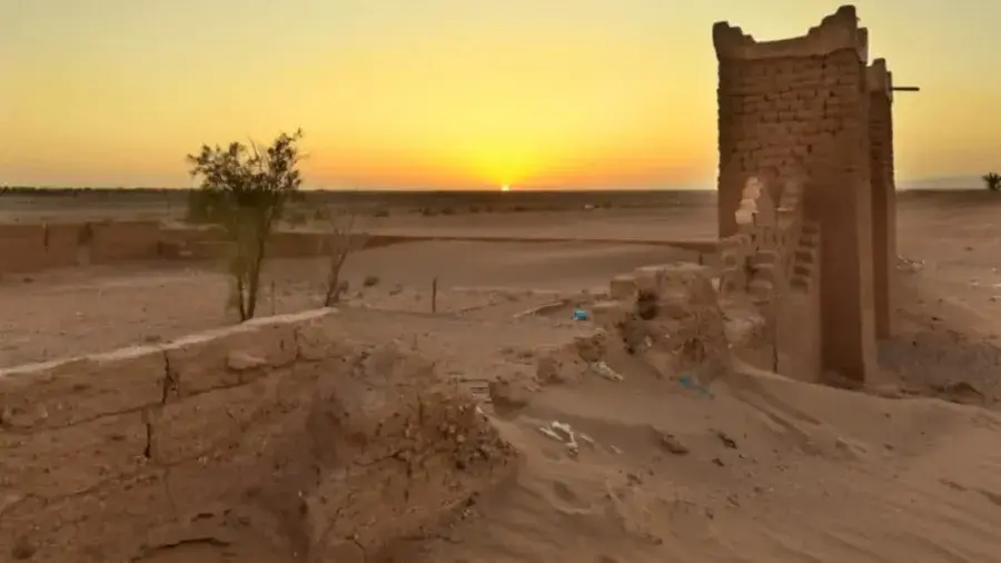 Weathered earthen remains of the old ksar at M'Hamid El Ghizlane