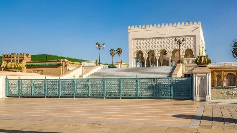 White marble Mausoleum of Mohammed V with green tiled roof in Rabat